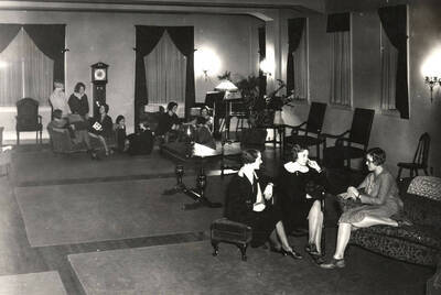 1932 photograph of Hays Hall. View of the women in their living room.