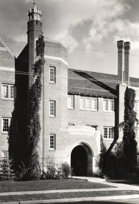 1930 photograph of Forney Hall. View of front entrance.