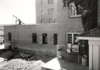 1936 photograph of Forney Hall. View from the back of Hays and Forney kitchen construction.