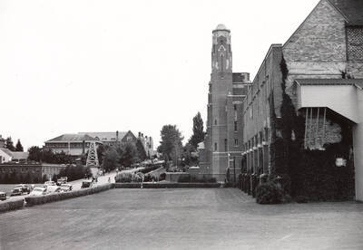 1940-06-16 photograph of Memorial Gymnasium. Graduates walk for commencements.