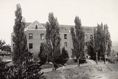 1942 photograph of Lindley Hall. View of landscaping.