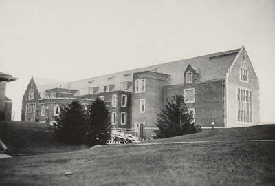 1924-12-03 photograph of Science Hall with construction debris in back. Renamed Life Sciences Building in 1964.