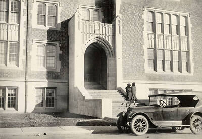 1924 photograph of Science Hall Renamed Life Sciences Building in 1964. Students enter the building for classes.