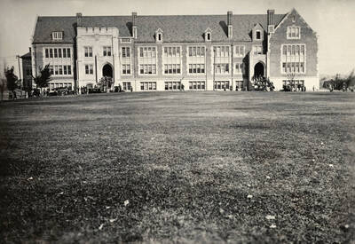 1925 photograph of Science Hall Renamed Life Sciences Building in 1964. View of students at the building entrances.