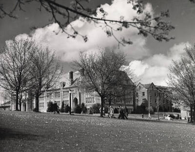 1944 photograph of Science Hall Renamed Life Sciences Building. View of students walking to class.