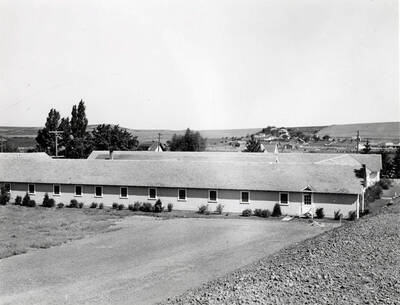 1936 photograph of Idaho Club. View of farms in the background.