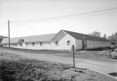 1936 photograph of Idaho Club. View from the corner of Sixth and Line Streets.