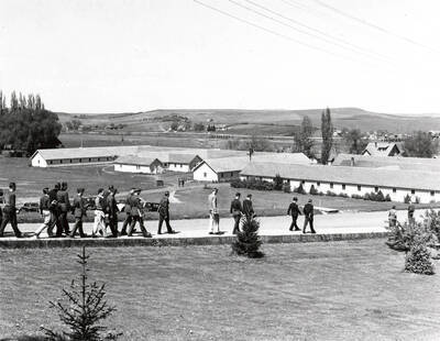 1940 photograph of Idaho Club. Men on the way back to their cooperative dormitory.