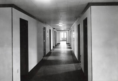 1937 photograph of Infirmary. View of the corridor.