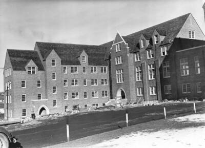 1938 photograph of Chrisman Hall. View of construction debris.