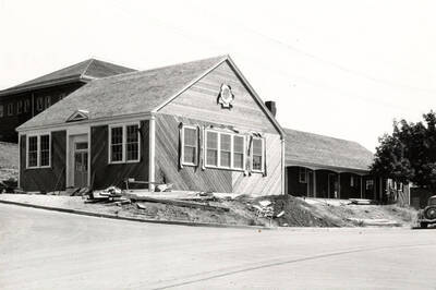 1935 photograph of University Classroom Building. View of construction debris.