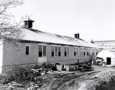 1970-05-01 photograph of Navy Building. View of the burned out building after the fire, surround by debris. Donor: Alumni Office.