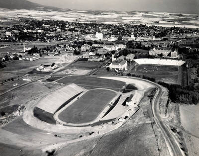 1937 photograph of Neale Stadium. Aerial view shows Neale Stadium and Campus with Moscow in the background.