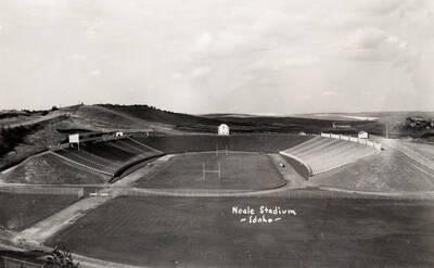 1937 photograph of Neale Stadium. View shows the score clock and the fields in the background.