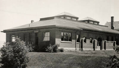 1926 photograph of Geology Building. View of the landscaping around the building.
