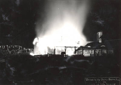 1932-04-21 photograph of Dairy Barn. View of the building on fire at night. Donor: Gerald Hodgins.