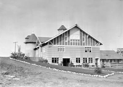 1930 photograph of Dairy Barn. View of the landscaping.