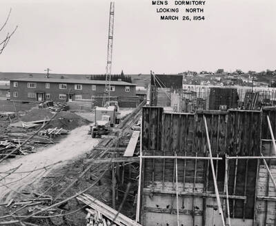 March 26, 1954 photograph of Gault Hall under construction. Construction equipment present.