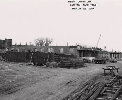 March 26, 1954 photograph of Gault Hall under construction. Crane in the background.