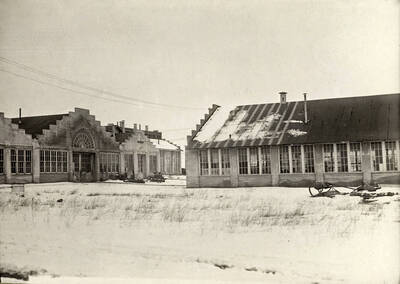 1924 photograph of the Engineering laboratories. Snow covers the scene.