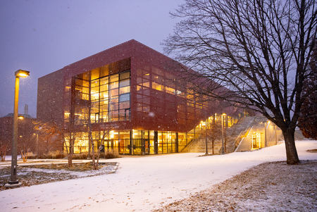 Seasonal view showing the IRIC with lights in the snow