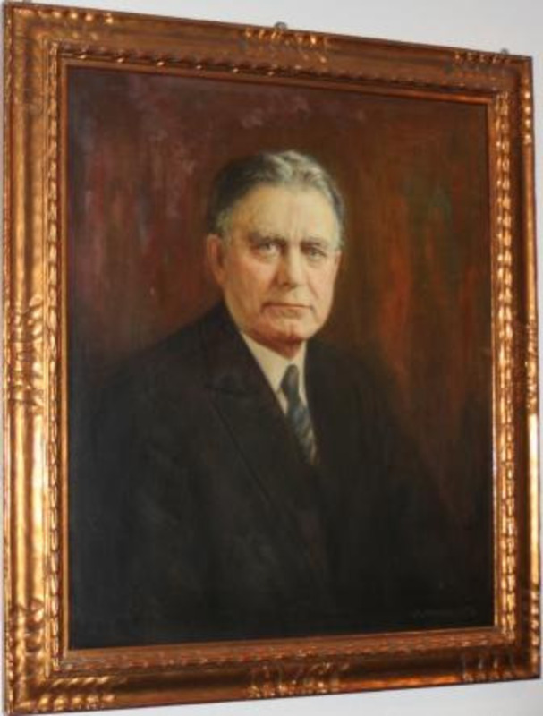 Portrait painting of Senator William Edgar Borah displayed in a decorative gilt wooden frame.