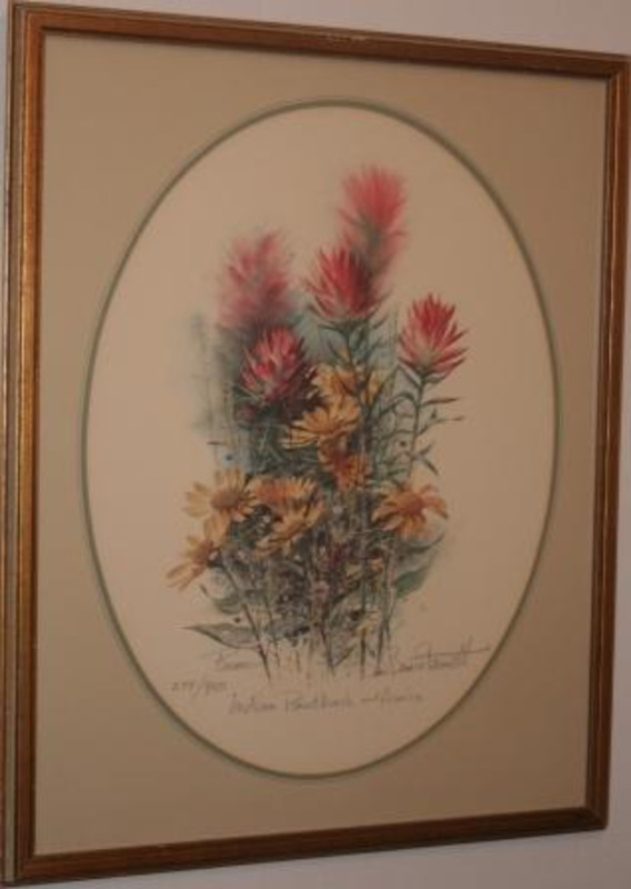 Painting of Indian paintbrush and arnia displayed with a green oval mat and gilt wood frame. #274 of 950.