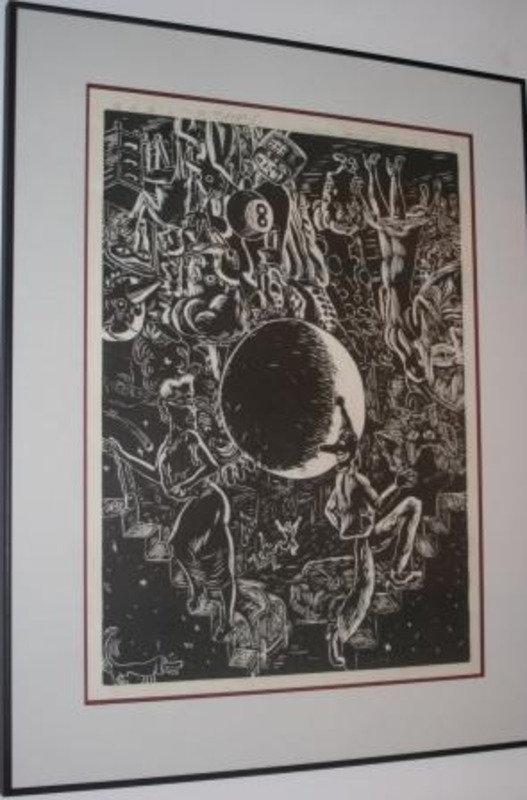 Black and white woodcut print depicting various figures and objects around a circular shape in the center. The piece is framed on light gray mat and in a metal frame. #8 of 10.