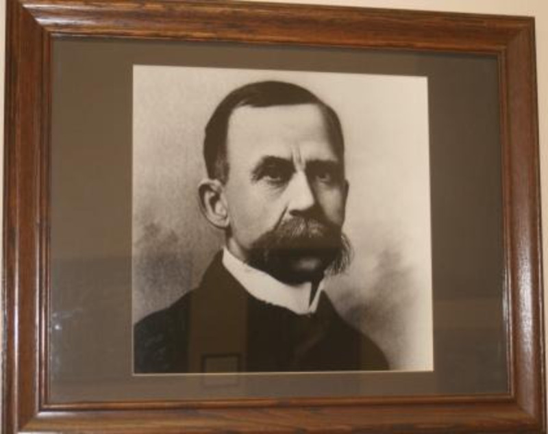 Black and white photograph of Joseph P. Blanton. This piece is displayed in a frame and under glass.
