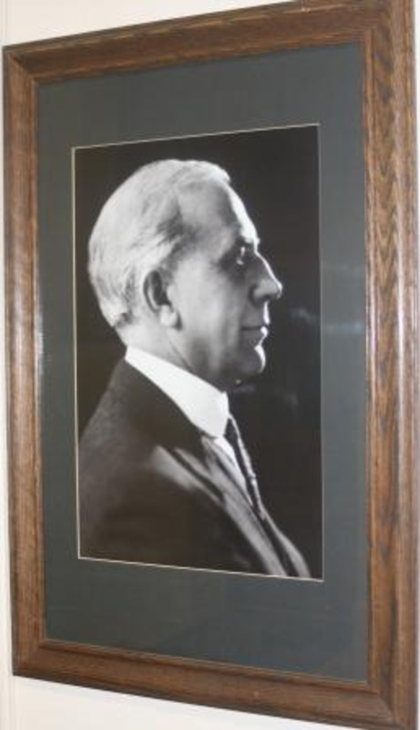 Black and white photograph of Melvin A. Brannon, president of the University of Idaho 1914–1917. Displayed under glass in a wooden frame.