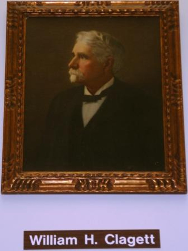 Painted color portrait of William H. Clagett displayed in an ornate gilt frame.