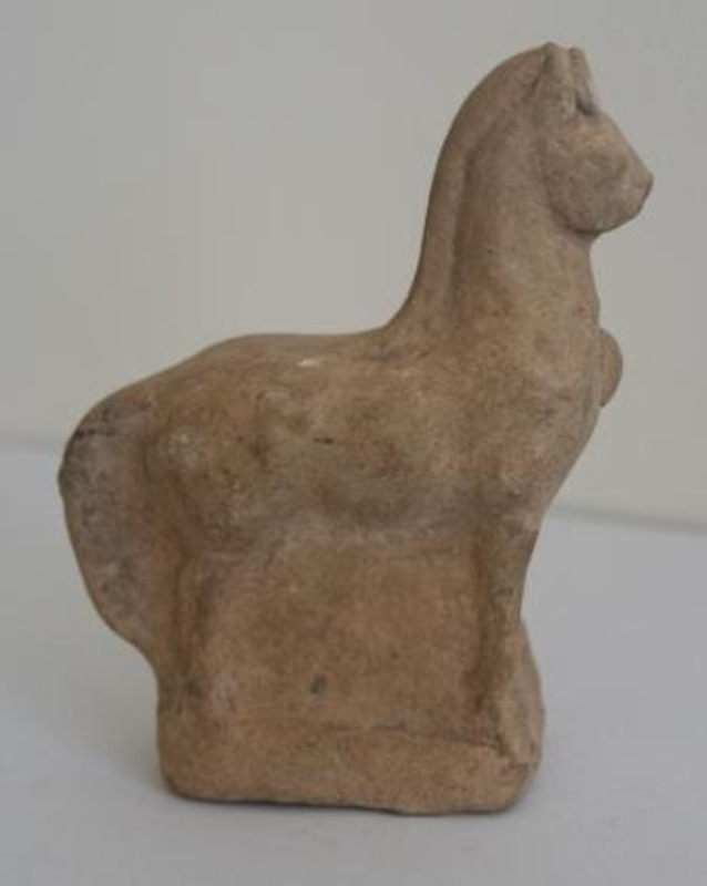 Terracotta sculpture depicting a horse.