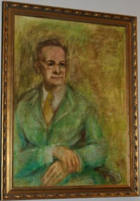 Portrait painting of Herbert S. Lattig displayed in a gilt frame with an inscription plaque.