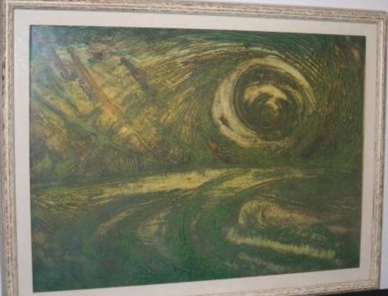 Collagraph print showing green swirls. Displayed using a white matte in a white textured wooden frame.