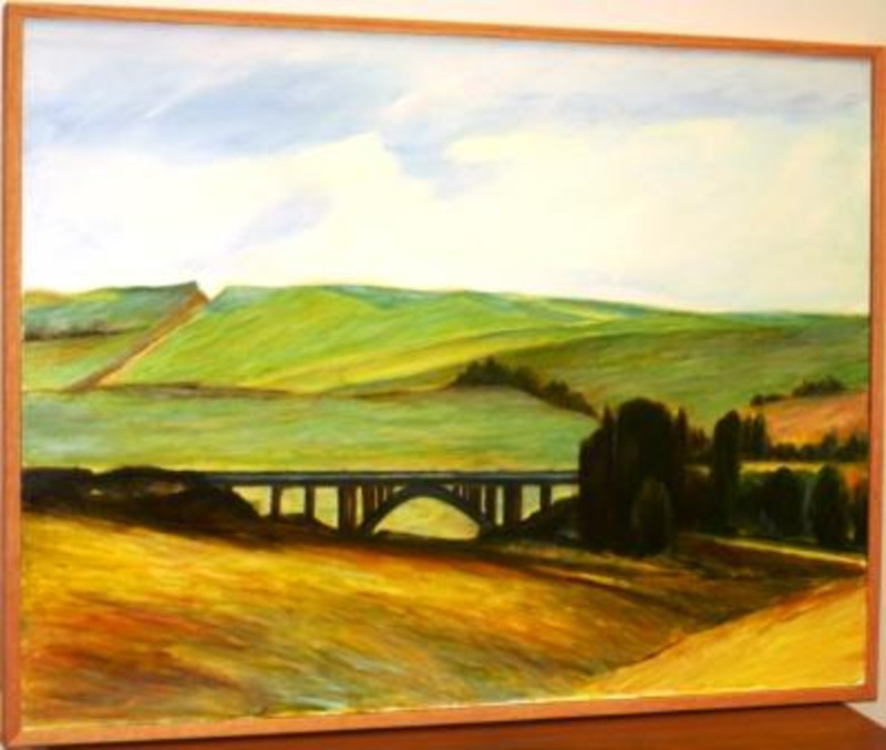 Painting showing a bridge and trees in the middle of rolling hills covered by farmland.