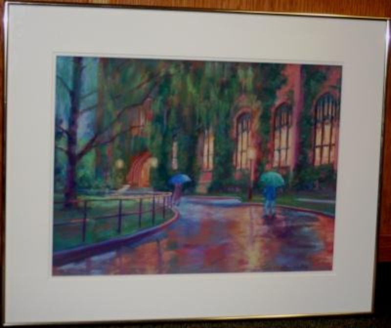 Painting showing the ivy covered face of the University of Idaho Administration building with two umbrella covered figures walking on the road in the rain.