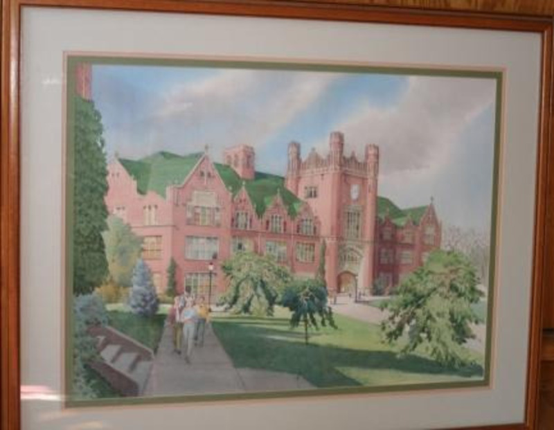 Painting showing a group of student walking toward an ivy covered building with the University of Idaho Administration building in the background. The painting is displayed using a grey mat with green and pink trim in a wooden frame.