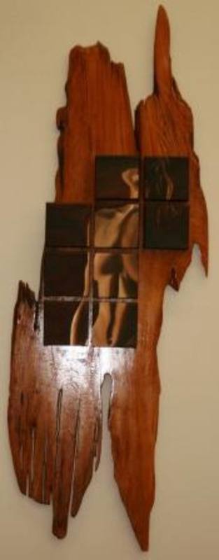 Painting showing the torso, neck and jaws of a nude female figure made from 8 canvas cells mounted on a piece of polished wood.