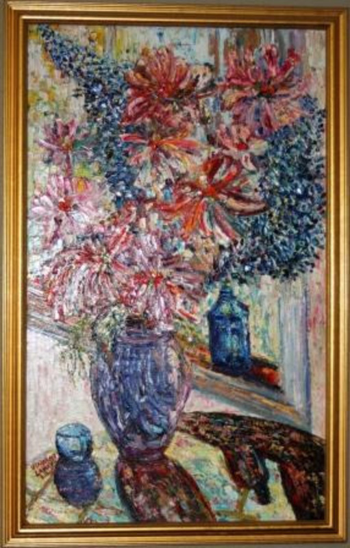 Painting of a floral arrangement of red, pink, and blue flowers in a purple vase. The canvas is displayed in a gold frame.