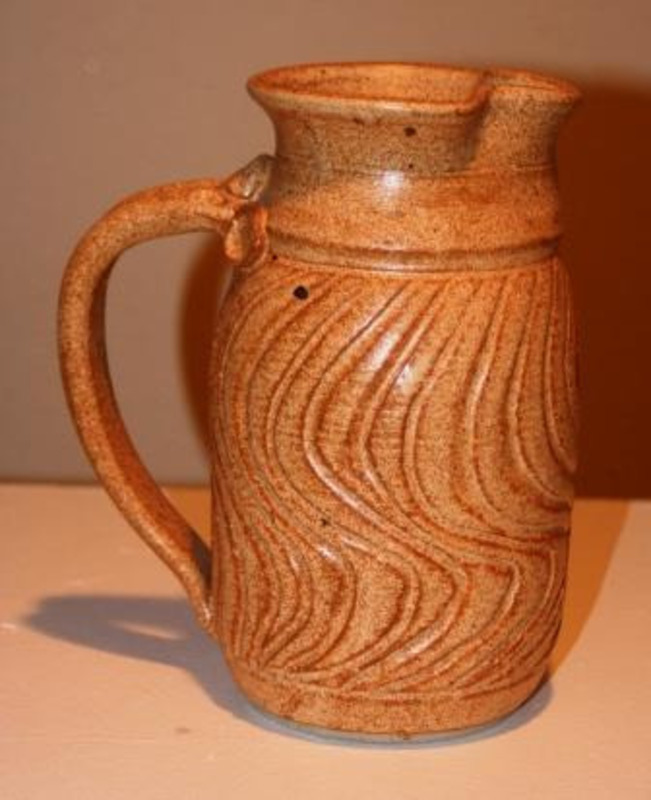Handmade porcelain pitcher that has been glazed and reduction fired. Acquired from Lewiston, Idaho.