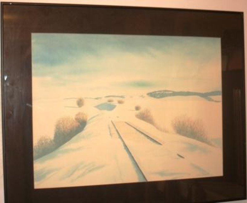 Painting of snow covered railroad tracks in a snowy landscape of rolling hills and barren bushes. Framed using a brown matte.