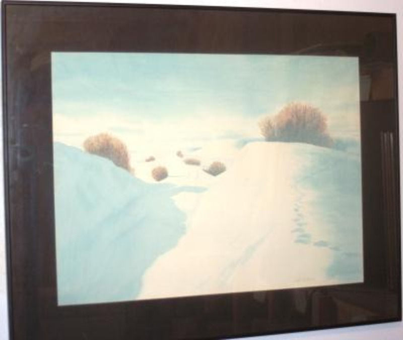 Painting showing a snow covered landscape with stands of barren bushes and tracks visible. Framed using a brown matte.