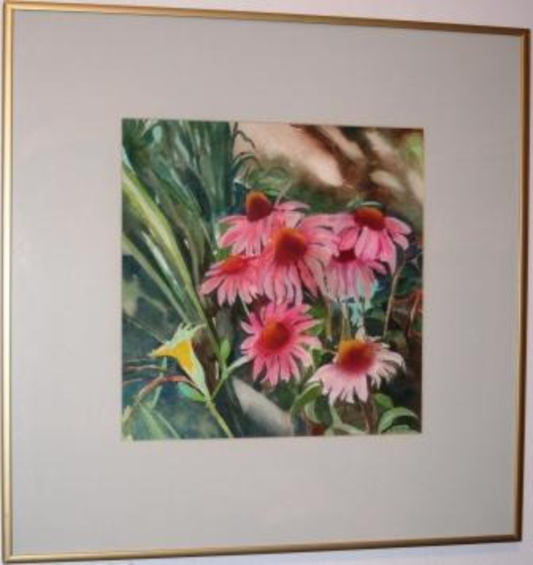 Painting of red flowers and green plants. The painting has a grey matte and gold frame.