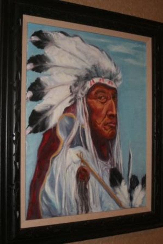Portrait painting of a Native American chief wearing a headdress.