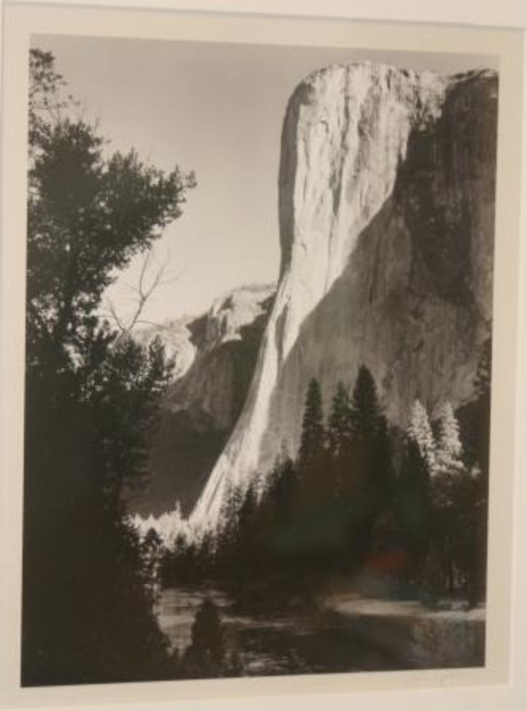 Photograph of sunrise on the face of El Capitan in Yosemite National Park.