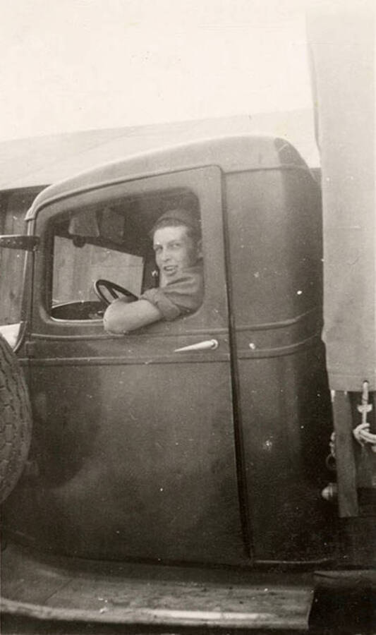 Photo of a CCC man in a truck. Writing under the photo reads: 'Lotte'.