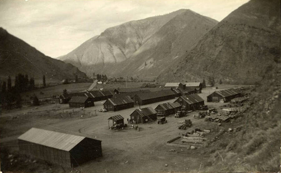 CCC Camp overview with mountains in the background.