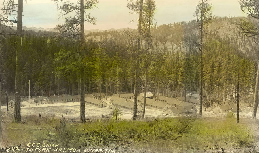 tinted photo of Camp South Fork Writing on the photo reads: ' #42 C.C.C. Camp So. Fork - Salmon River IDA'.