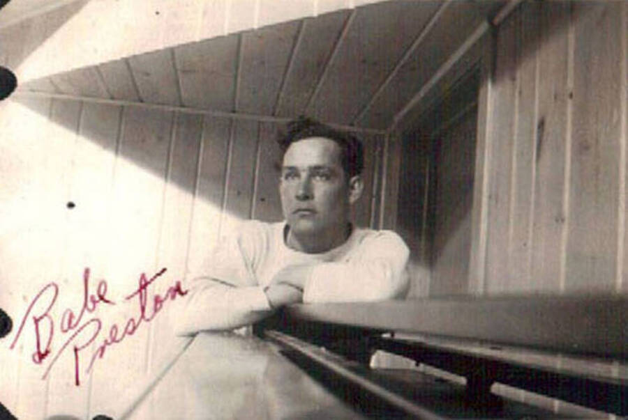 Photo of a CCC enrollee. Writing on the photo reads: 'Babe Preston' Writing beneath the photo reads: 'Lewiston Gym'.