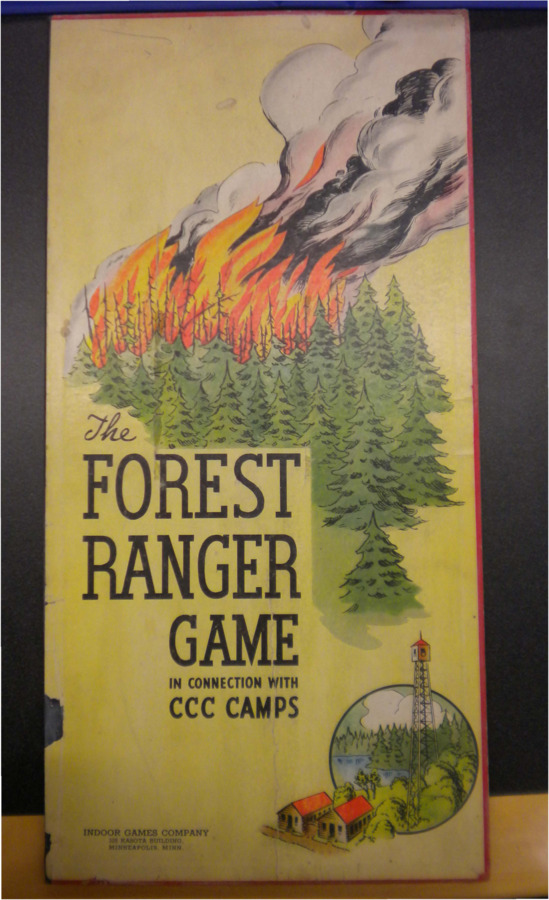 Forest Ranger Game with CCC Camps. Pictured are the box, gameboard, instructions, game cards, and money. The game cards also contain facts about the CCC.